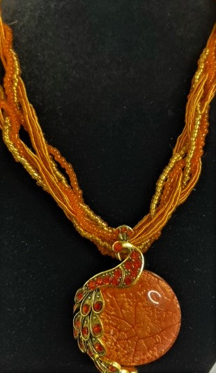 Rhinestone Embellished Peacock on the Moon Pendant